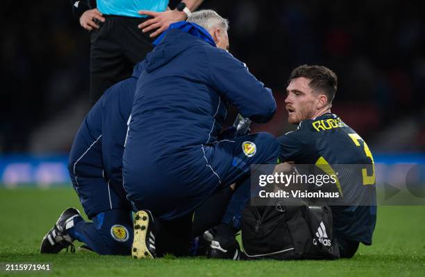 Andrew Robertson of Scotland is treated for an injury during the international friendly match between Scotland and Northern Ireland at Hampden Park...