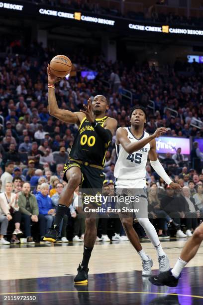 Jonathan Kuminga of the Golden State Warriors goes up for a dunk against the Memphis Grizzlies at Chase Center on March 20, 2024 in San Francisco,...