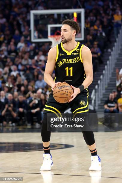 Klay Thompson of the Golden State Warriors gets ready to shoot the ball against the Memphis Grizzlies at Chase Center on March 20, 2024 in San...