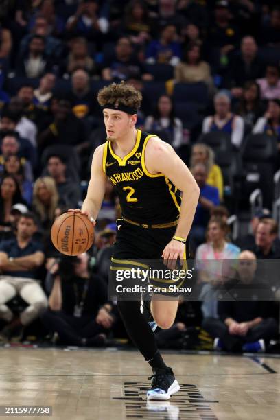 Brandin Podziemski of the Golden State Warriors dribbles the ball against the Memphis Grizzlies at Chase Center on March 20, 2024 in San Francisco,...