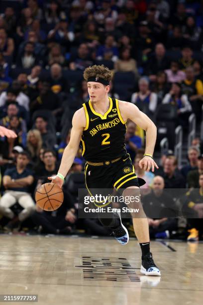 Brandin Podziemski of the Golden State Warriors dribbles the ball against the Memphis Grizzlies at Chase Center on March 20, 2024 in San Francisco,...