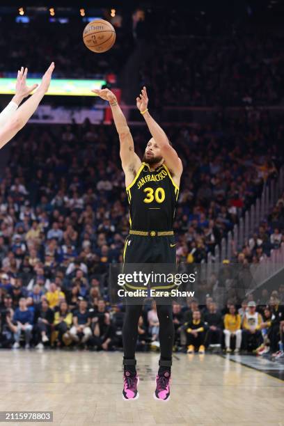 Stephen Curry of the Golden State Warriors shoots the ball against the Memphis Grizzlies at Chase Center on March 20, 2024 in San Francisco,...