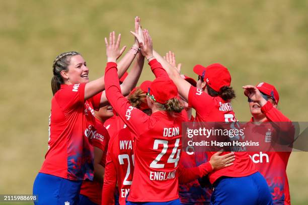 Lauren Bell of England celebrates after taking the wicket of Suzie Bates of New Zealand during game four of the Women's T20 International series...