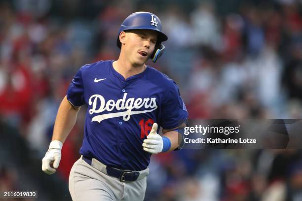 Will Smith of the Los Angeles Dodgers runs to first base after hitting a home run in the third inning of an exhibition game against the Los Angeles...