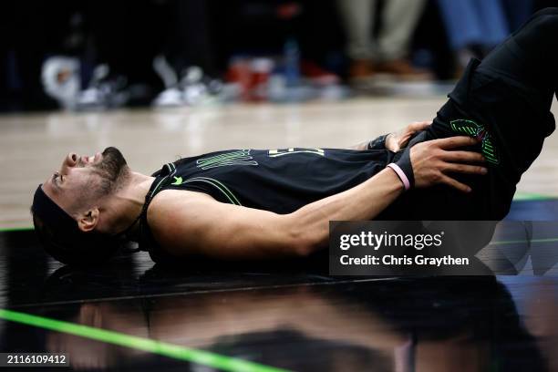 Jose Alvarado of the New Orleans Pelicans lies on the ground after an injury against the Oklahoma City Thunder at Smoothie King Center on March 26,...