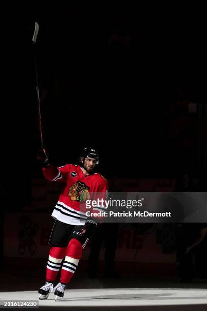 Landon Slaggert of the Chicago Blackhawks celebrates after a game against the Calgary Flames at the United Center on March 26, 2024 in Chicago,...