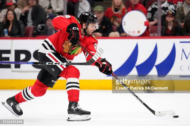Landon Slaggert of the Chicago Blackhawks shoots the puck during the second period against the Calgary Flames at the United Center on March 26, 2024...