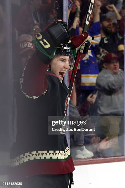 Josh Doan of the Arizona Coyotes celebrates his first career NHL goal in a game against the Columbus Blue Jackets at Mullett Arena on March 26, 2024...