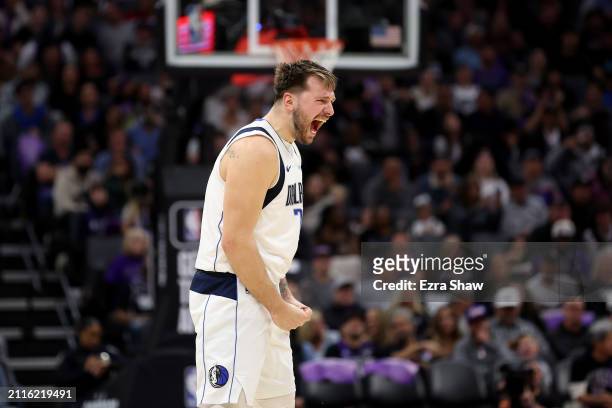 Luka Doncic of the Dallas Mavericks reacts after the Mavericks scored a basket Sacramento Kings in the second half at Golden 1 Center on March 26,...