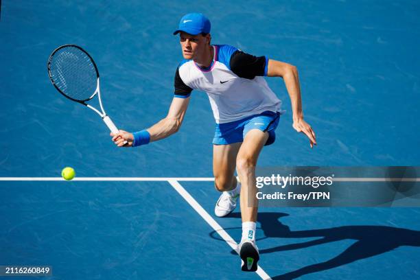 Alex Sinner of Italy hits a forehand against Christopher O'Connell of Australia in the fourth round of the Miami Open at the Hard Rock Stadium on...