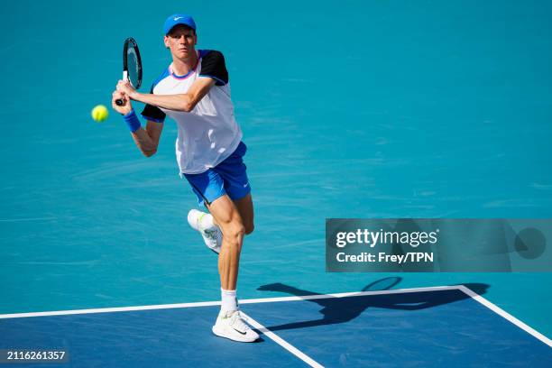 Alex Sinner of Italy hits a backhand against Christopher O'Connell of Australia in the fourth round of the Miami Open at the Hard Rock Stadium on...