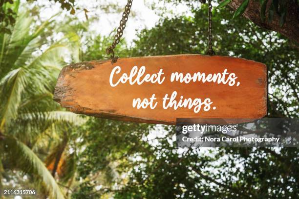 collect moments not things inspirational quotes on wood signage - health motivational quotes stock pictures, royalty-free photos & images