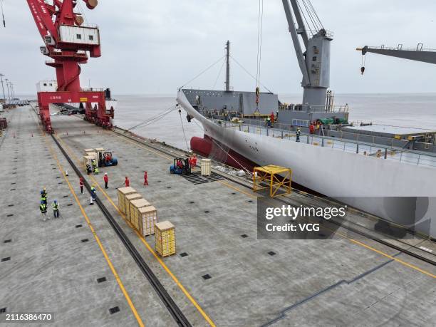 Refrigerated cargo ship carrying imported kiwifruit arrives at Nangang Port on March 26, 2024 in Shanghai, China. The first batch of this year's...