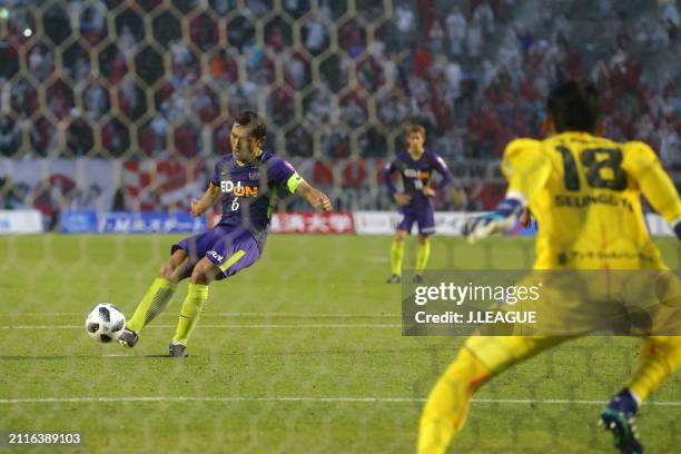 Toshihiro Aoyama of Sanfrecce Hiroshima converts the penalty to score the team's first goal during the J.League J1 match between Sanfrecce Hiroshima...