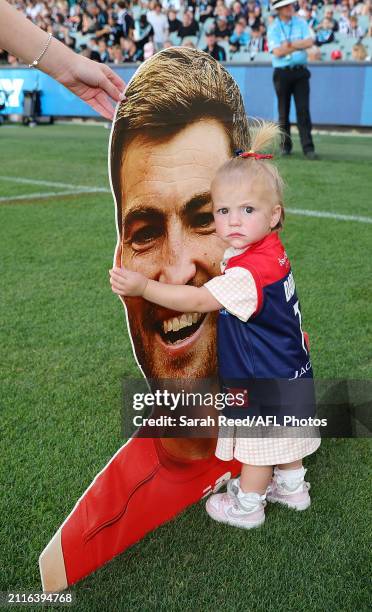 Jack Viney of the Demons set to play his 200th game. One of his daughters wait for him to run out during the 2024 AFL Round 03 match between the Port...