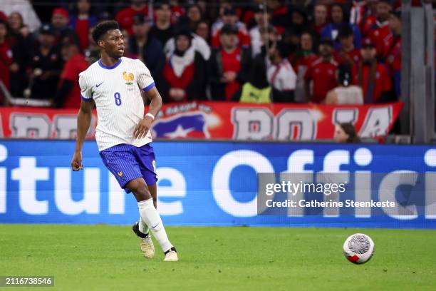 Aurelien Tchouameni of France passes the ball during the international friendly match between France and Chile at Stade Velodrome on March 26, 2024...