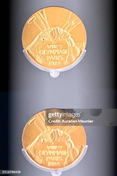 View of the five Olympic gold medals won by Paavo 'The Flying Finn' Nurmi at the 1924 Paris Olympics go on display at the " D'or, d'argent, de bronze...