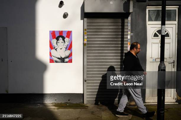 New work by American street artist Pegasus, depicting Catherine, the Princess of Wales, as superhero Wonder Woman is seen on a wall on March 27, 2024...