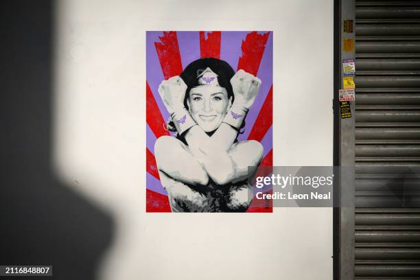 New work by American street artist Pegasus, depicting Catherine, the Princess of Wales, as superhero Wonder Woman is seen on a wall on March 27, 2024...