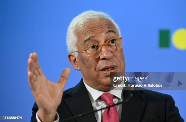 Outgoing Portuguese Prime Minister Antonio Costa gestures while answering questions after reviewing his eight years in office during a press...