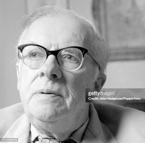 English scientist and evolutionary biologist Sir Julian Huxley seated in a living room at home in Pond Street in Hampstead, North London in 1968.
