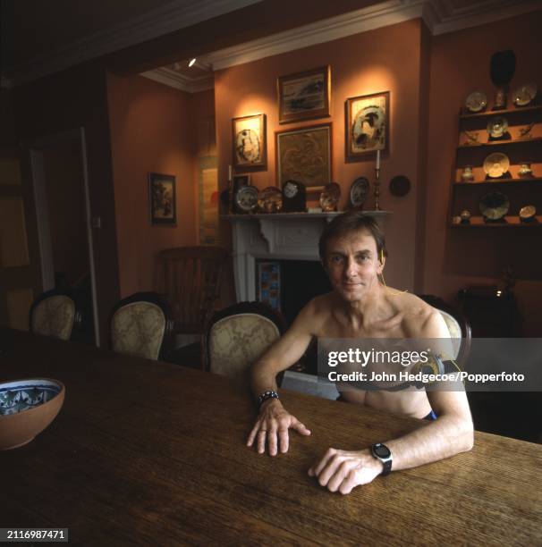 English scientist and neurobiologist Colin Blakemore posed seated at the kitchen table of a house in England in 1977. Colin Blakemore currently works...