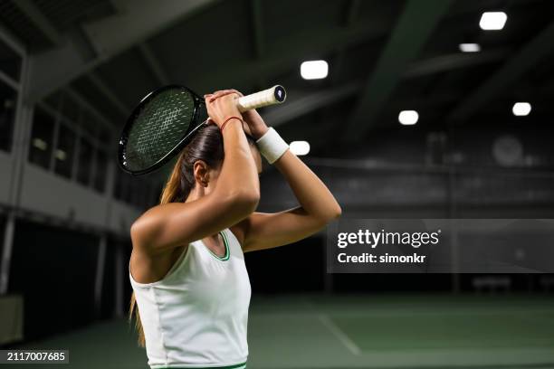 tennis player is disappointed after match - self defeat stock pictures, royalty-free photos & images