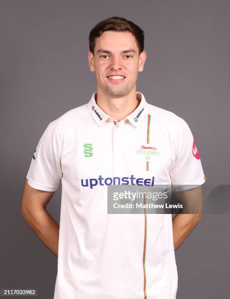 Scott Currie of Leicestershire poses for a portrait during the Leicestershire CCC photocall at Uptonsteel County Ground on March 25, 2024 in...
