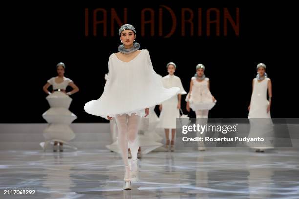 Model showcases designs by Ian Adrian on Pulse of Runway show during Indonesia Fashion Week 2024 on March 27, 2024 in Jakarta, Indonesia.