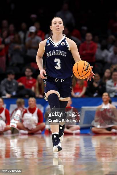 Anne Simon of the Maine Black Bears controls the ball during the NCAA Women's Basketball Tournament First Round game against the Ohio State Buckeyes...