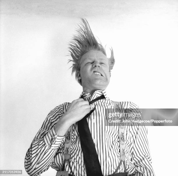 English magazine publisher Jocelyn Stevens posed wearing a striped shirt, tie and braces in London circa 1965. Jocelyn Stevens is the publisher and...