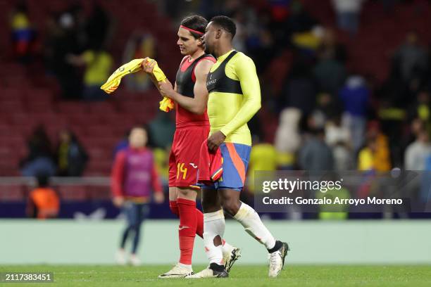 Ianis Hagi of Romania and Carlos Cuesta of Colombia exchange t-shirts after the friendly match between Romania and Colombia at Civitas Metropolitan...