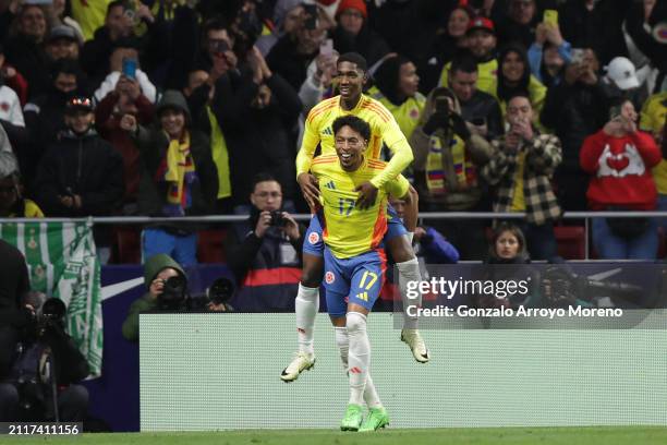 Yaser Asprilla of Colombia celebrates scoring their third goal with teammate Johan Mojica during the friendly match between Romania and Colombia at...