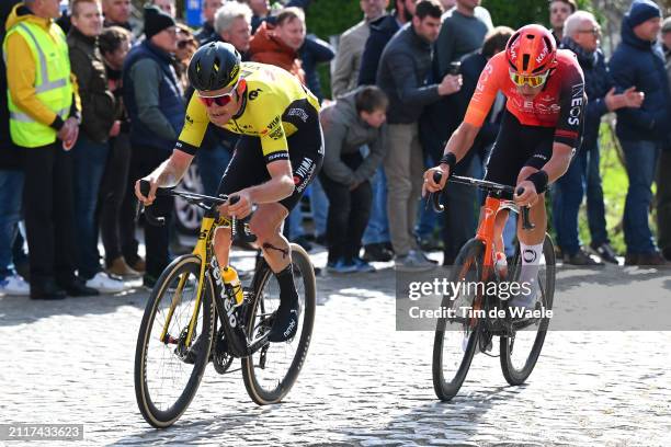 Tiesj Benoot of Belgium and Team Visma | Lease a Bike and Joshua Tarling of The United Kingdom and Team INEOS Grenadiers compete in the breakaway...