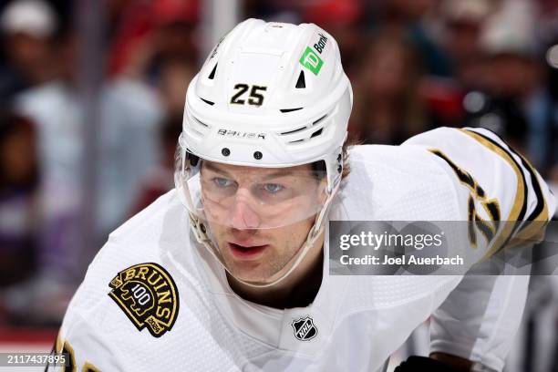 Brandon Carlo of the Boston Bruins prepares for a face-off against the Florida Panthers at the Amerant Bank Arena on March 26, 2024 in Sunrise,...