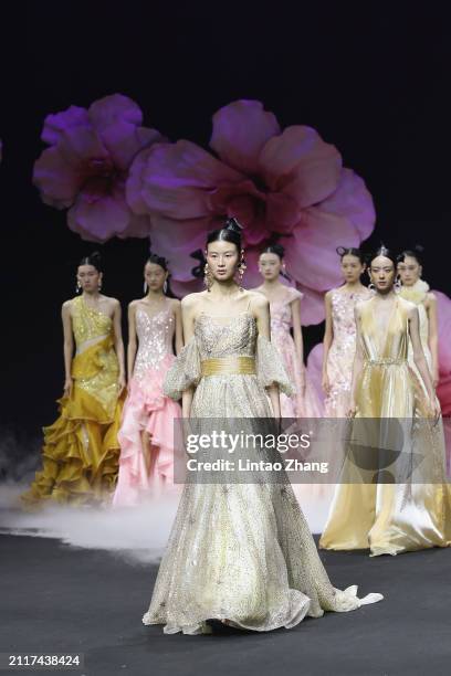 Models walk the runway at the LAFAVEURE collection show by designers Sharon Guan at China Fashion Week A/W 2024 on March 27, 2024 in Beijing, China.