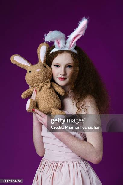 beautiful girl wearing pink dress - strapless dress stock pictures, royalty-free photos & images