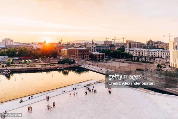 aerial view of oslo cityscape at sunset, norway - oslo foto e immagini stock