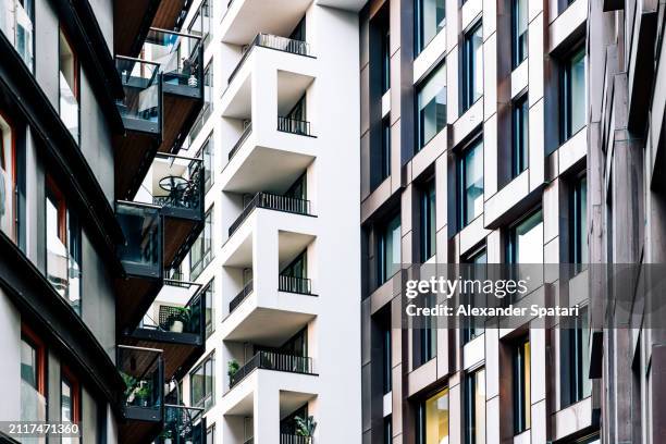 new modern apartment buildings in aker brygge district, oslo, norway - oslo business stock pictures, royalty-free photos & images