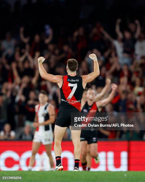 Zach Merrett of the Bombers reacts after the final siren during the 2024 AFL Round 03 match between the Essendon Bombers and the St Kilda Saints at...