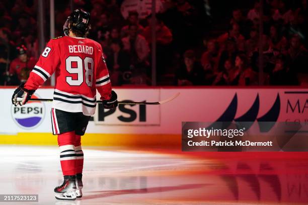 Connor Bedard of the Chicago Blackhawks skates before a game against the Calgary Flames at the United Center on March 26, 2024 in Chicago, Illinois.