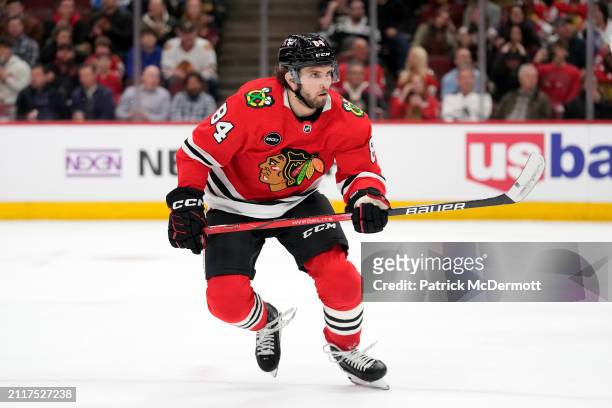 Landon Slaggert of the Chicago Blackhawks skates during the second period against the Calgary Flames at the United Center on March 26, 2024 in...