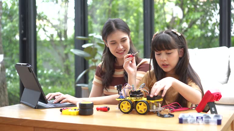 Mother Computer Programmer 237 Mom Daughter Fixing Car Stock Videos, Footage, & 4K Video Clips ...