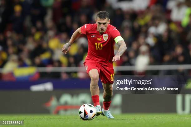Nicolae Stanciu of Romania controls the ball during the friendly match between Romania and Colombia at Civitas Metropolitan Stadium on March 26, 2024...