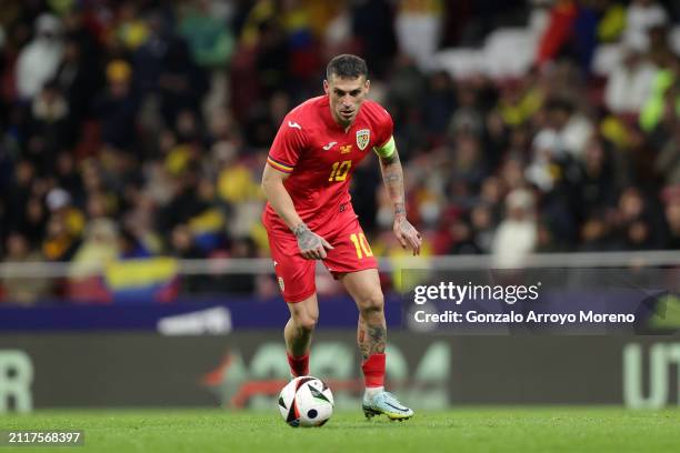 Nicolae Stanciu of Romania controls the ball during the friendly match between Romania and Colombia at Civitas Metropolitan Stadium on March 26, 2024...