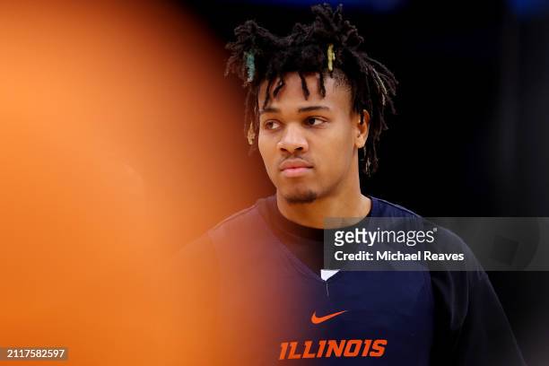 Terrence Shannon Jr. #0 of the Illinois Fighting Illini looks on during practice ahead of the NCAA Men's Basketball Tournament Sweet 16 round at TD...