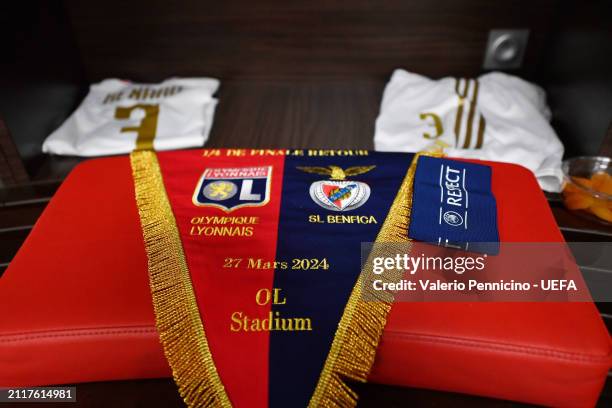 Detailed view of the match pennant and UEFA Respect Captain's Armband are displayed inside the Olympique Lyonnais dressing room prior to the UEFA...