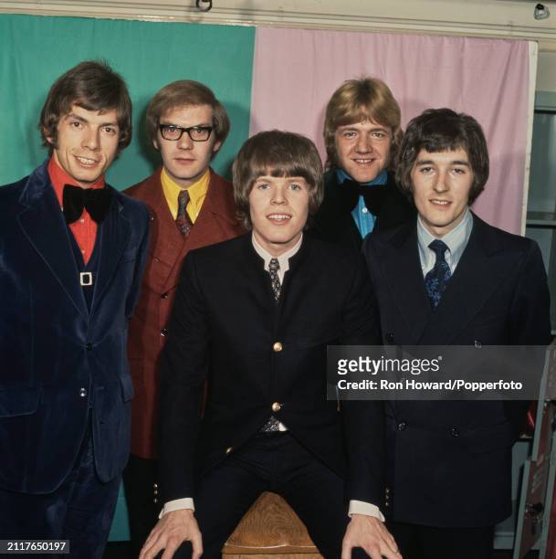English pop group Herman's Hermits posed backstage in London circa 1970. Members of the band are, from left, drummer Barry Whitwam, guitarist Derek...