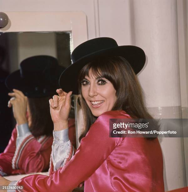 English actress and singer Anita Harris posed backstage in London circa 1967.