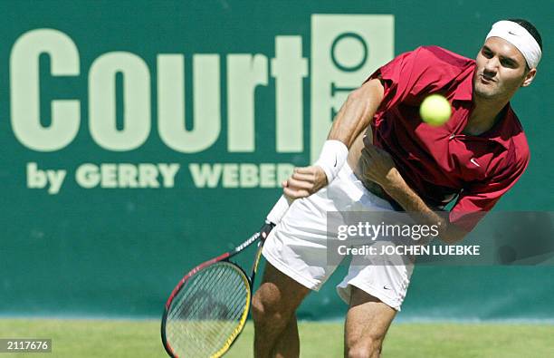 Swiss Roger Federer returns the ball Moroccan Younes El Aynaoui, 13 June 2003, during their quarterfinal match of the ATP Gerry Weber tennis Open in...